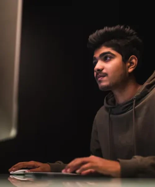 indian-man-hacker-using-computers-stealing-data-desk_231208-3619